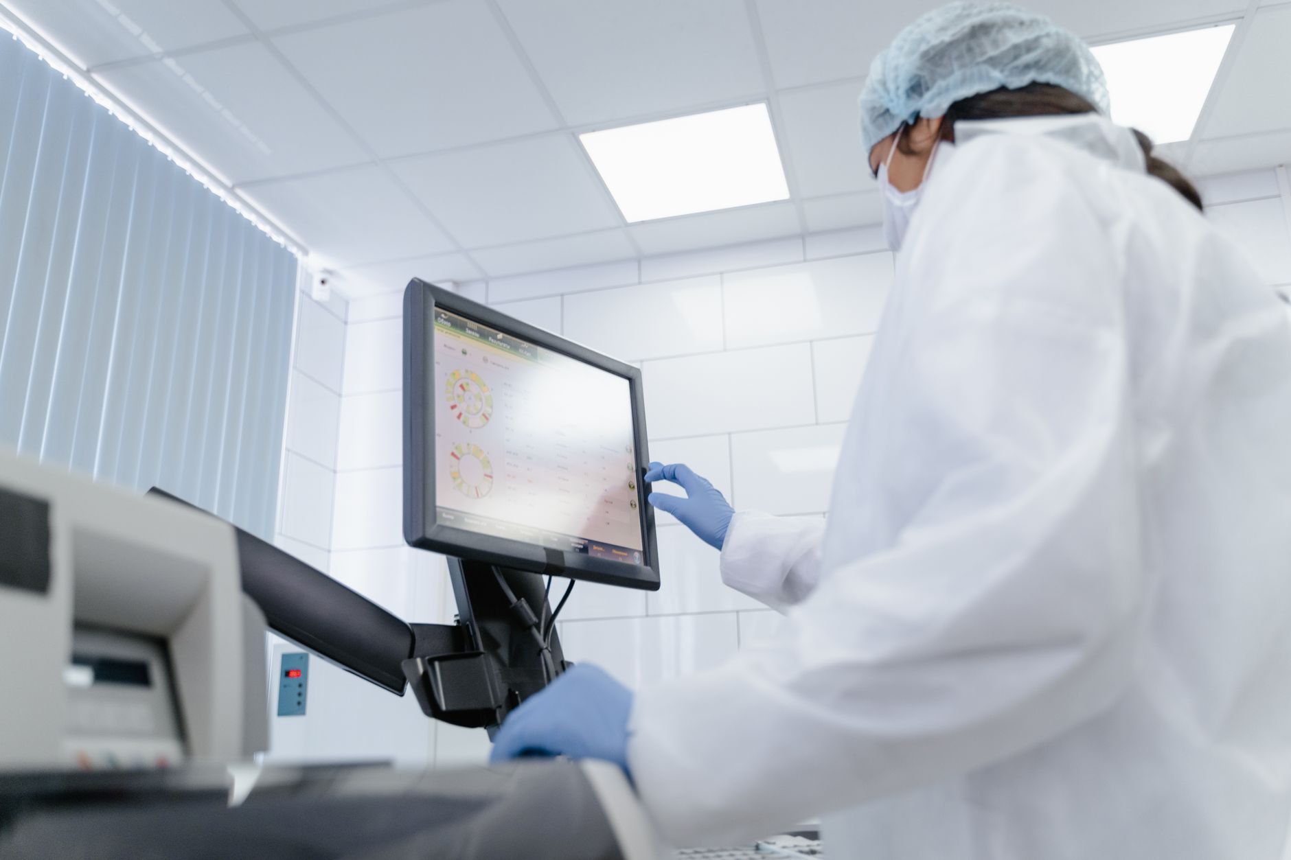 A clinic marketing team reviewing international patient acquisition ROI data on a dashboard screen