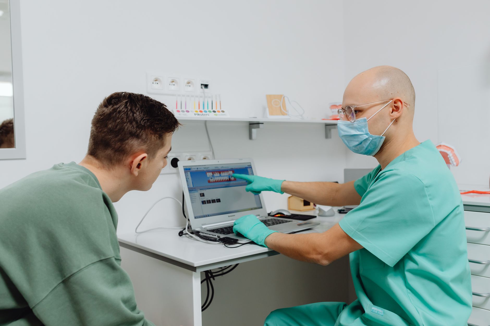 A patient coordinator using AI-powered messaging tools to respond to international patient enquiries across time zones